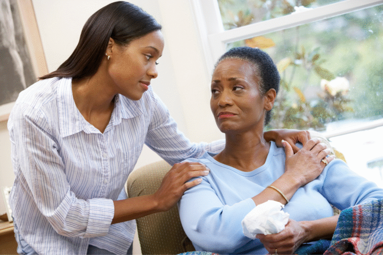 a woman comforting a woman
