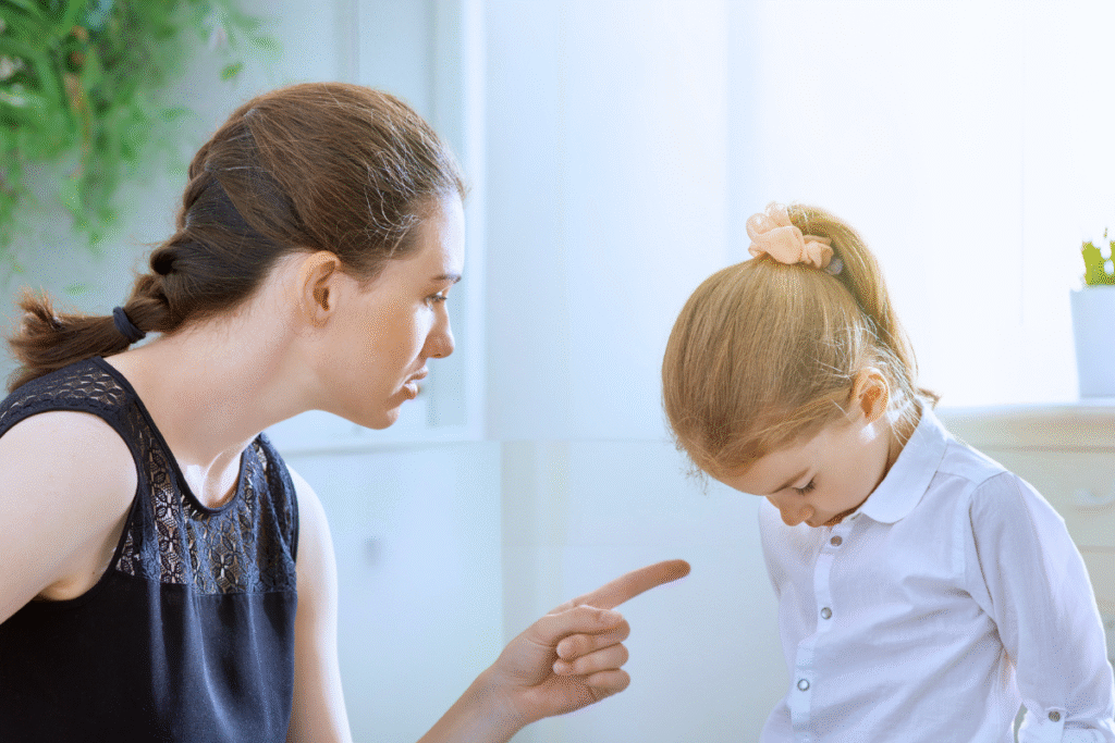 Authoritarian religious upbringing - mom pointing finger at daughter